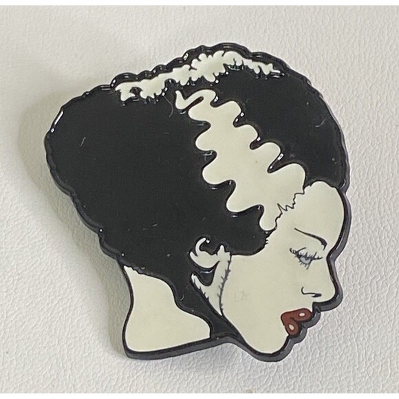 Authentic UNIVERSAL Bride of Frankenstein Glow In The Dark Enamel Pin - Picture 1 of 6